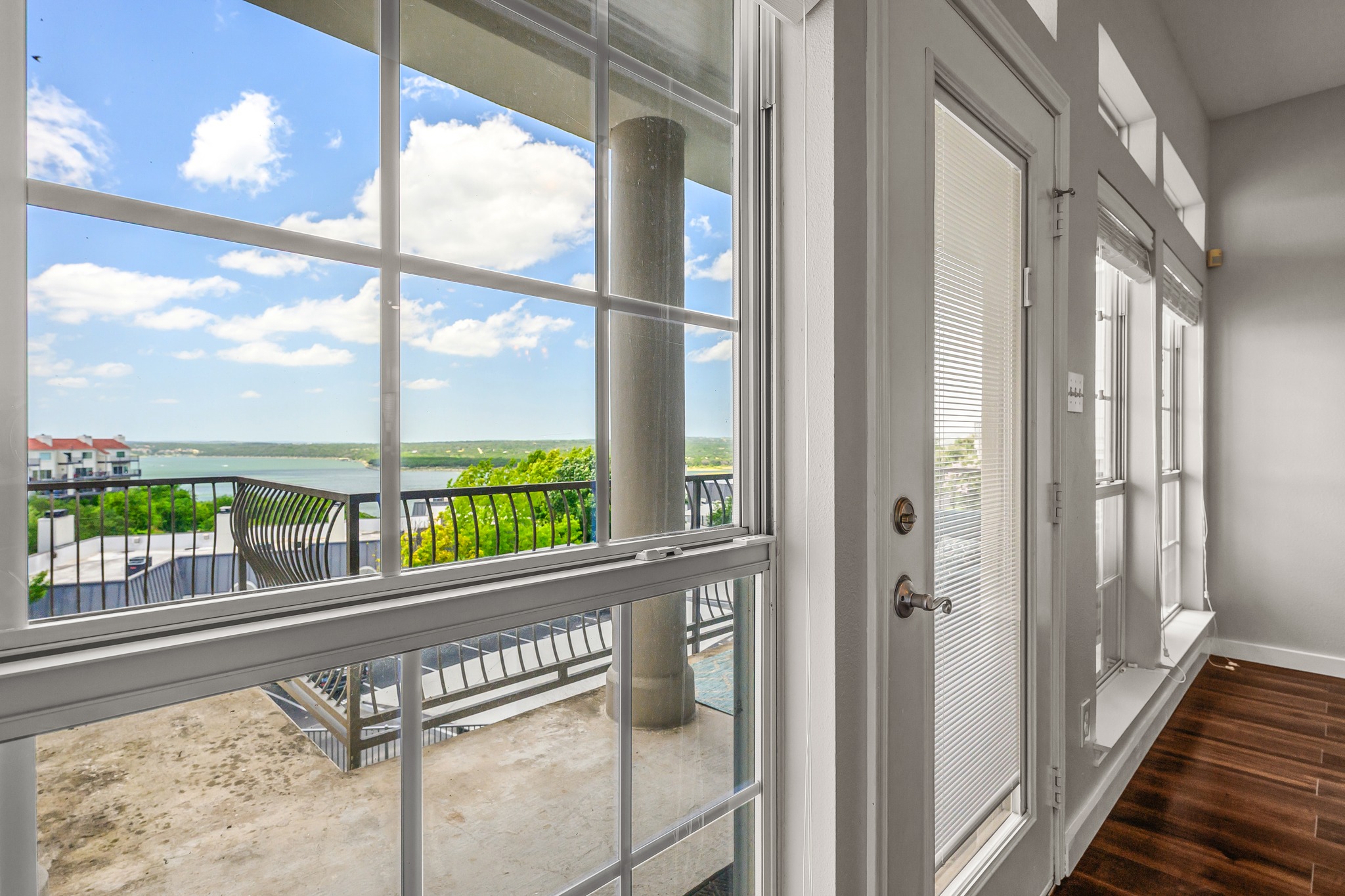 2918 Ranch Road 620 North, Unit S242 Austin, TX 78734 - Photo 16 of 35 Breathtaking water views extend from this generous balcony, perfect for serene outdoor moments.