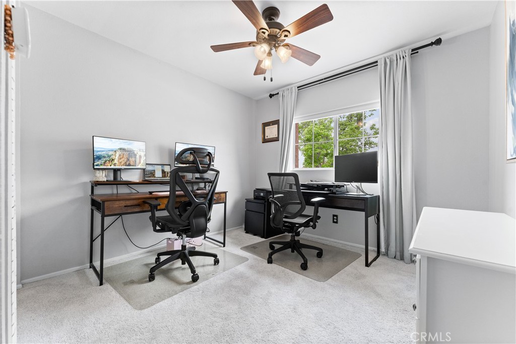 853 Cheyenne Road Corona, CA 92878 - Photo 7 of 8 a view of a workspace with furniture and a window