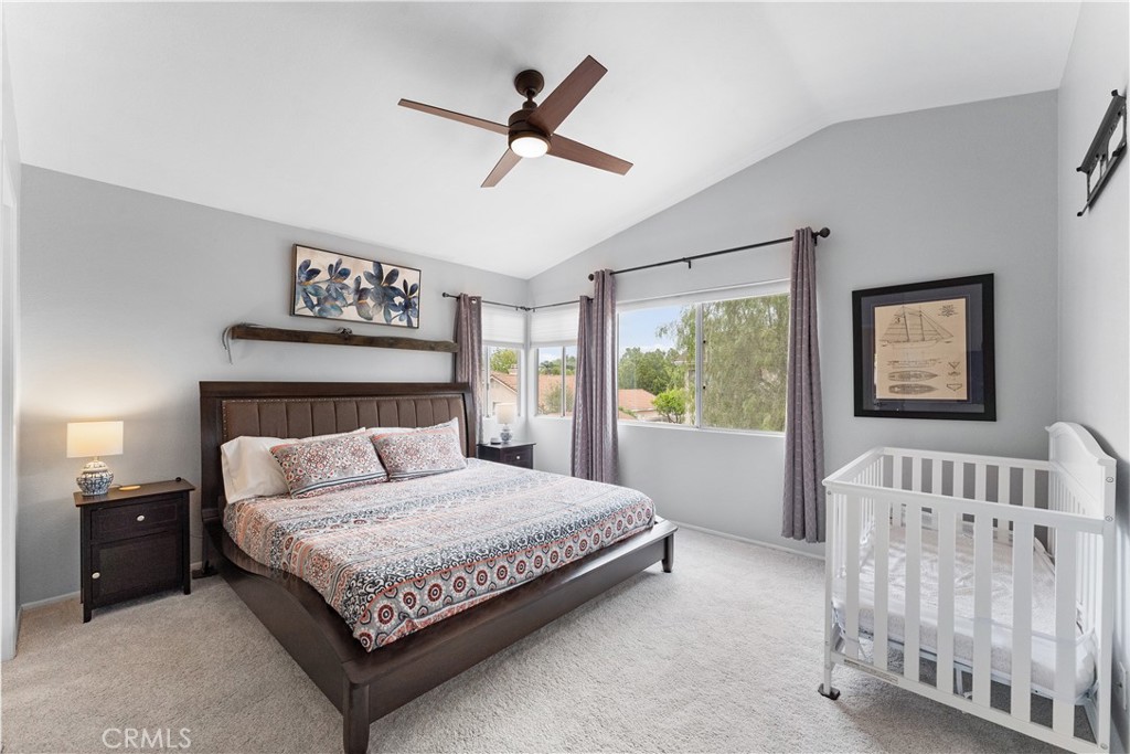 853 Cheyenne Road Corona, CA 92878 - Photo 8 of 8 a bedroom with a bed and a painting on the wall