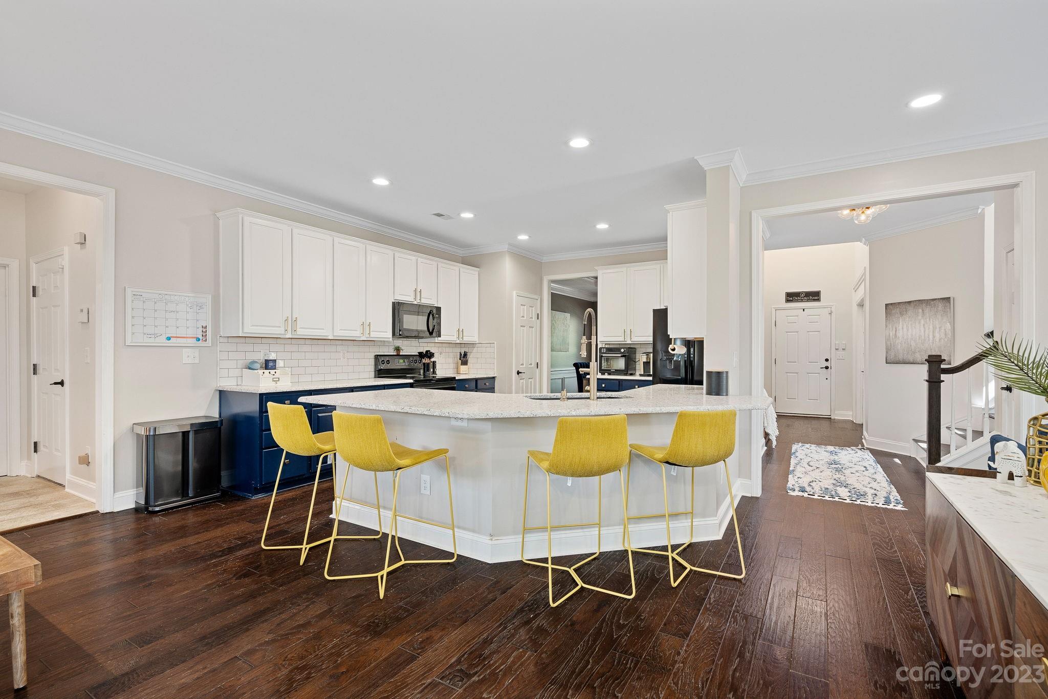 512 St George Road Fort Mill, SC 29708 - Photo 14 of 35 a view of kitchen dining table chairs and wooden floor