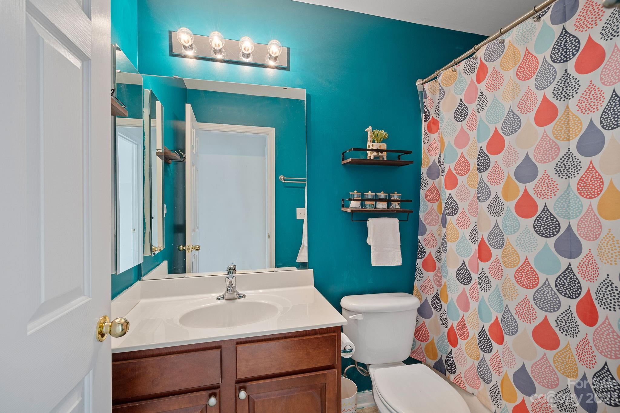 512 St George Road Fort Mill, SC 29708 - Photo 25 of 35 a bathroom with a sink and a mirror with toilet