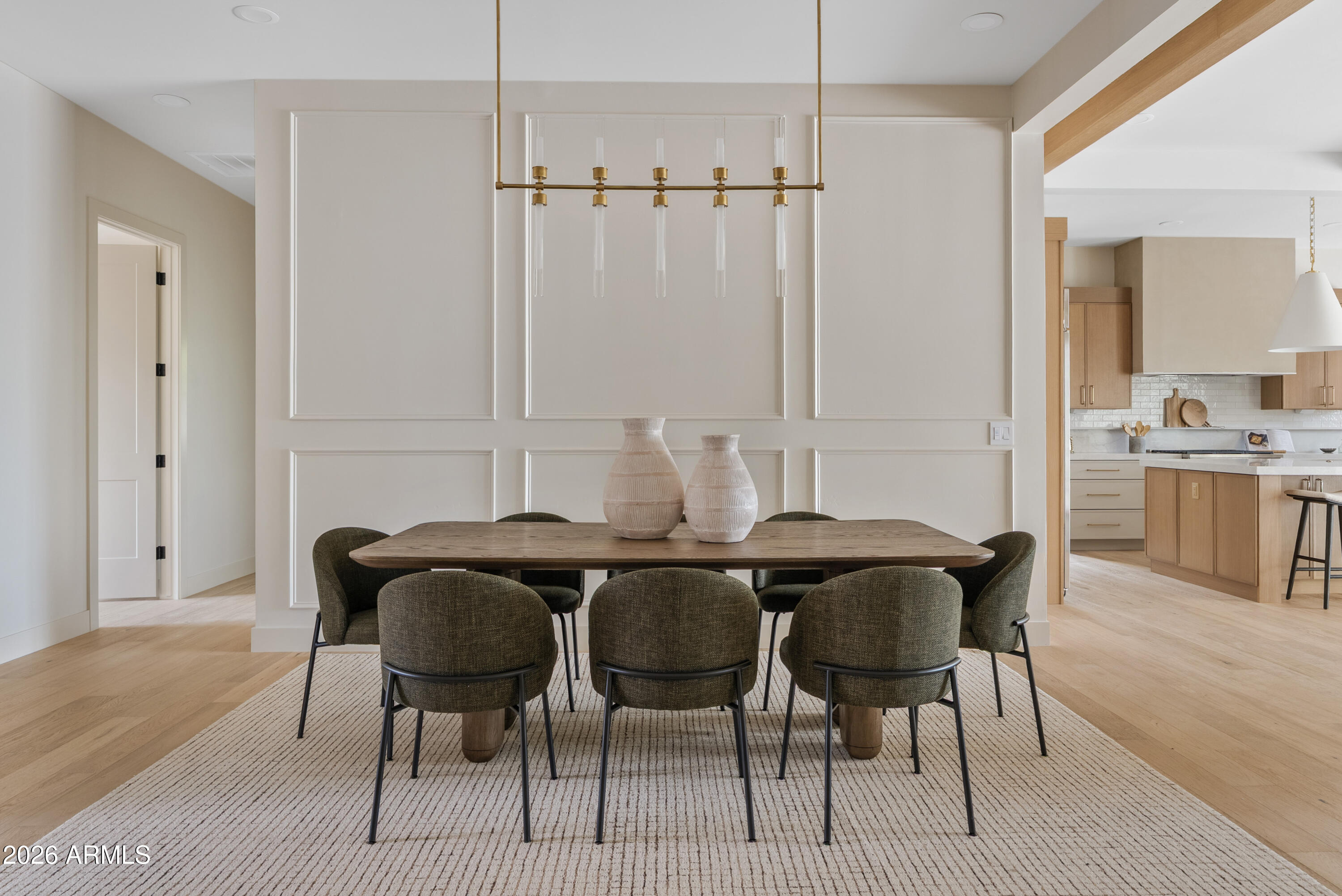 4035 East Osborn Road Phoenix, AZ 85018 - Photo 12 of 63 a view of a dining room with furniture and wooden floor