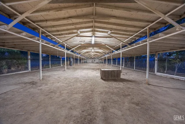 a view of a swimming pool and lake from a balcony