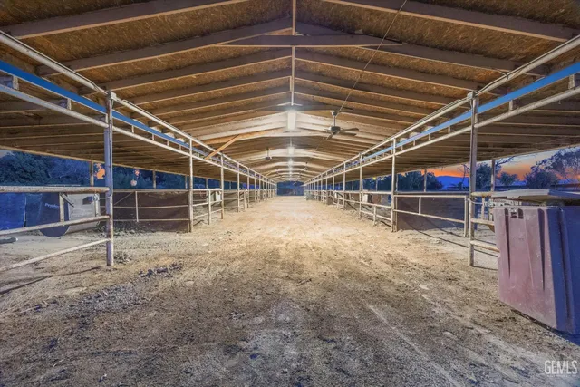 swimming pool view with a lake view