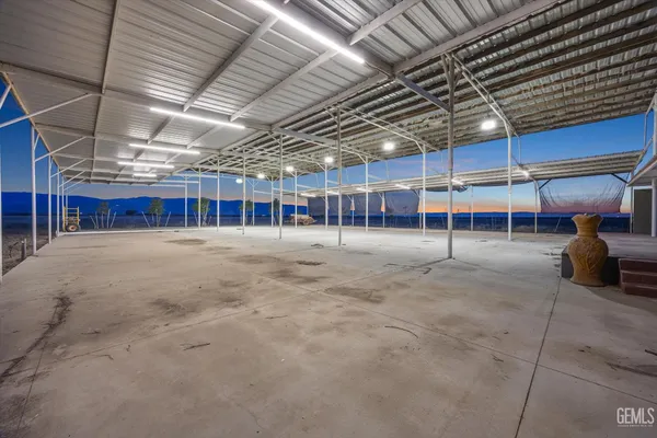 swimming pool view with a lake view