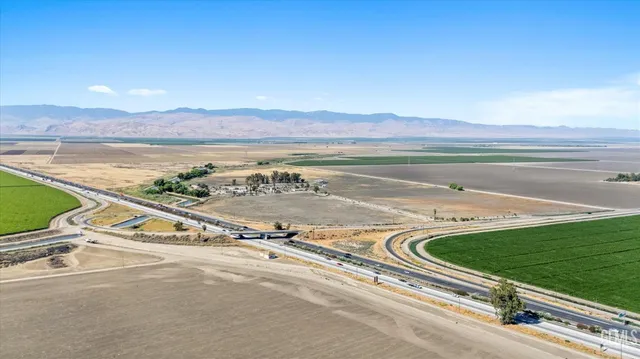 a view of a garage with wooden floor