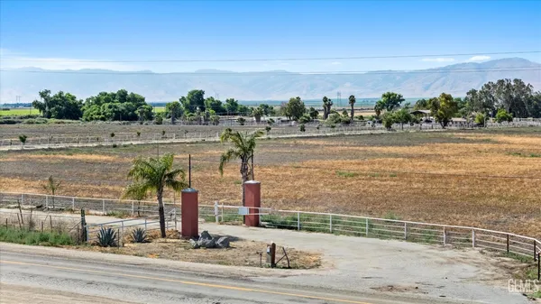 a view of a balcony with chairs