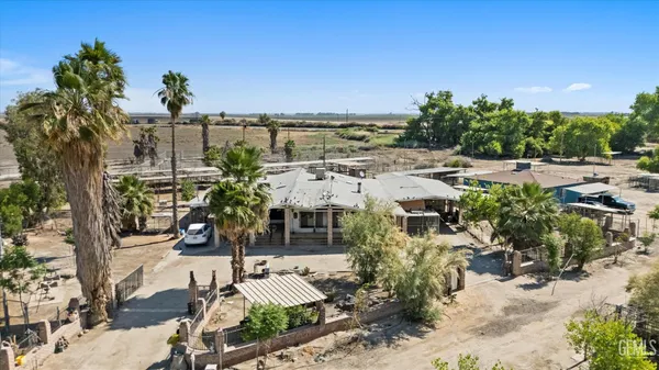 an aerial view of residential building with beach