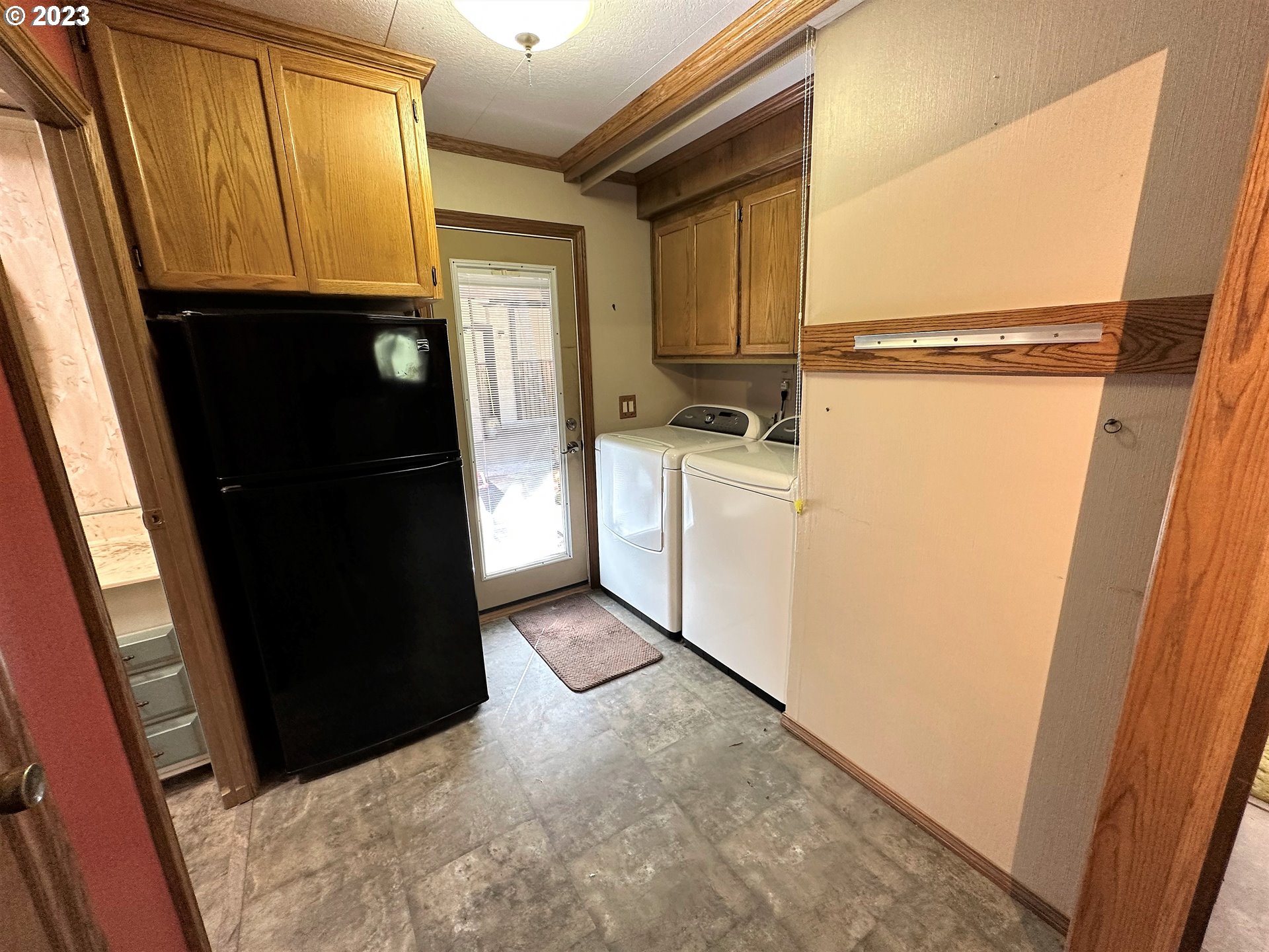 3153 Strickland Canyon Road Roseburg, OR 97471 - Photo 16 of 31 a view of a storage & utility room with refrigerator stove