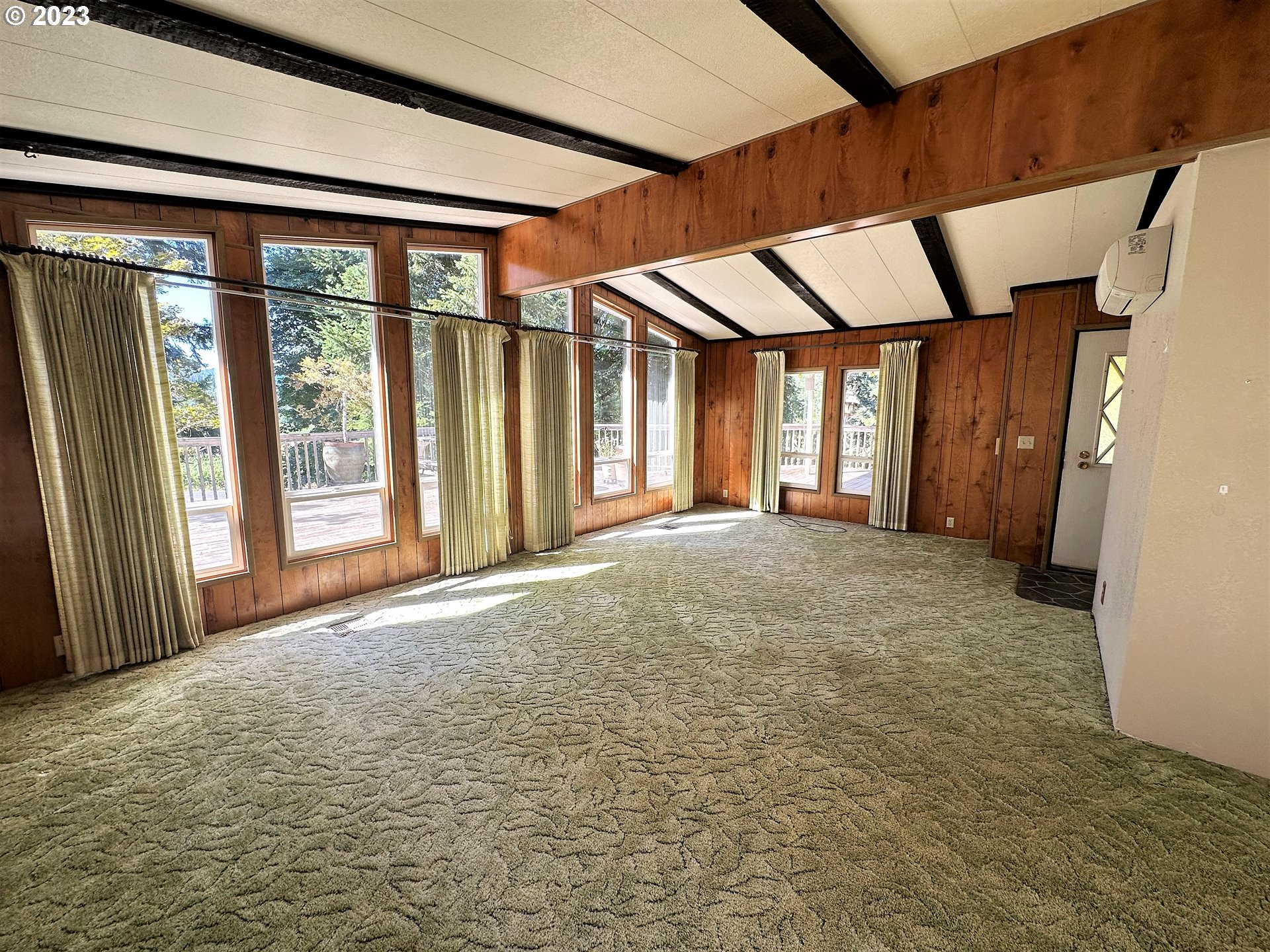 3153 Strickland Canyon Road Roseburg, OR 97471 - Photo 3 of 31 a view of an empty room with a window