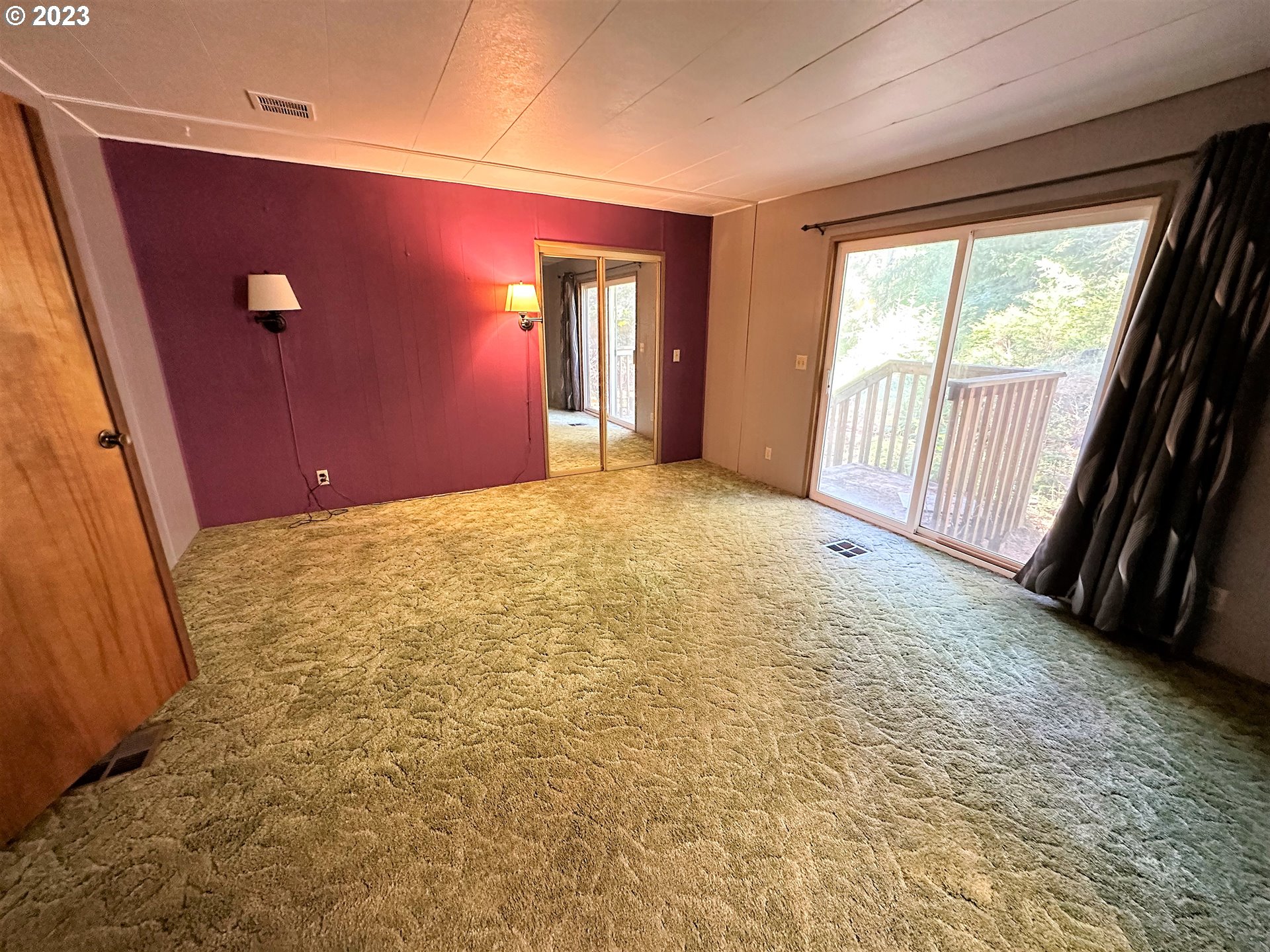 3153 Strickland Canyon Road Roseburg, OR 97471 - Photo 10 of 31 a view of an empty room with a fireplace