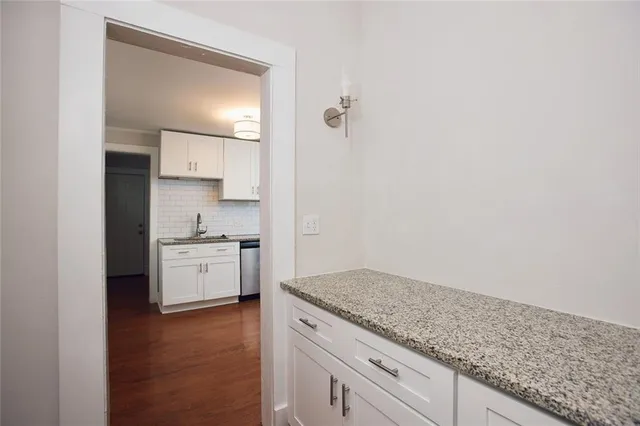 a bathroom with a shower and a toilet