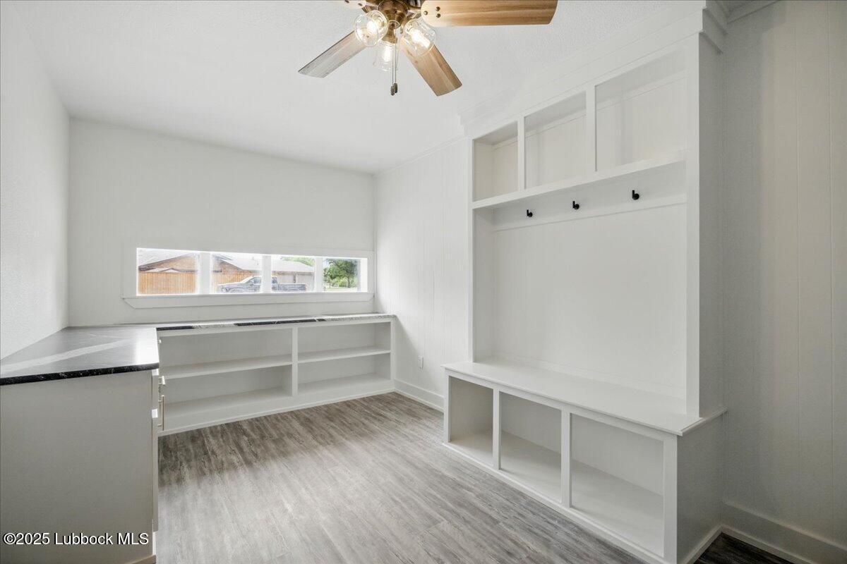 4214 64th Street Lubbock, TX 79413 - Photo 12 of 32 a view of an empty walk in closet