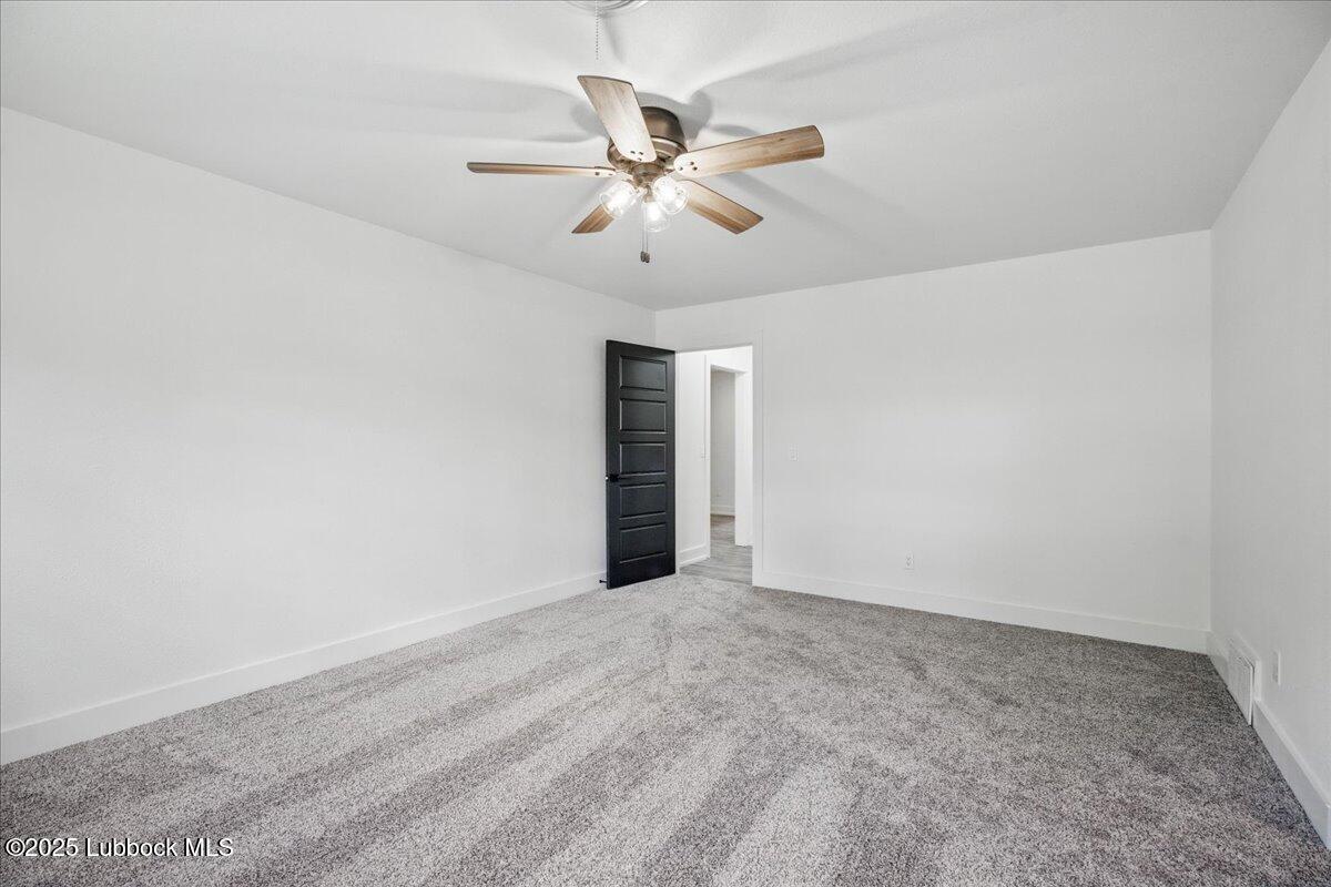 4214 64th Street Lubbock, TX 79413 - Photo 17 of 32 wooden floor in an empty room