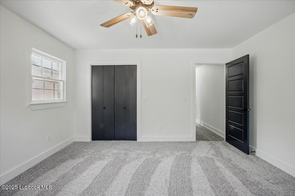 4214 64th Street Lubbock, TX 79413 - Photo 29 of 32 a view of an empty room with a window