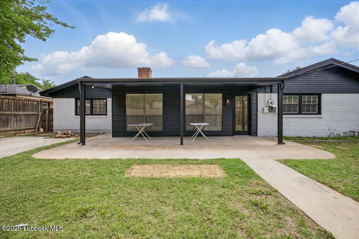 4214 64th Street Lubbock, TX 79413 - Photo 31 of 32 a view of a house with backyard and porch