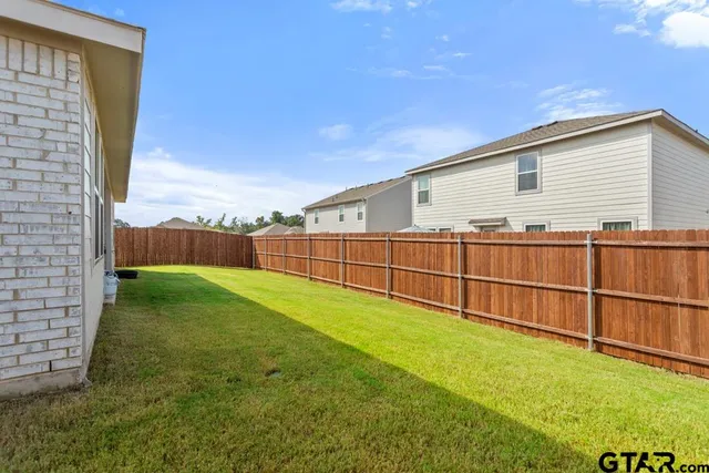 a view of an outdoor space and a backyard