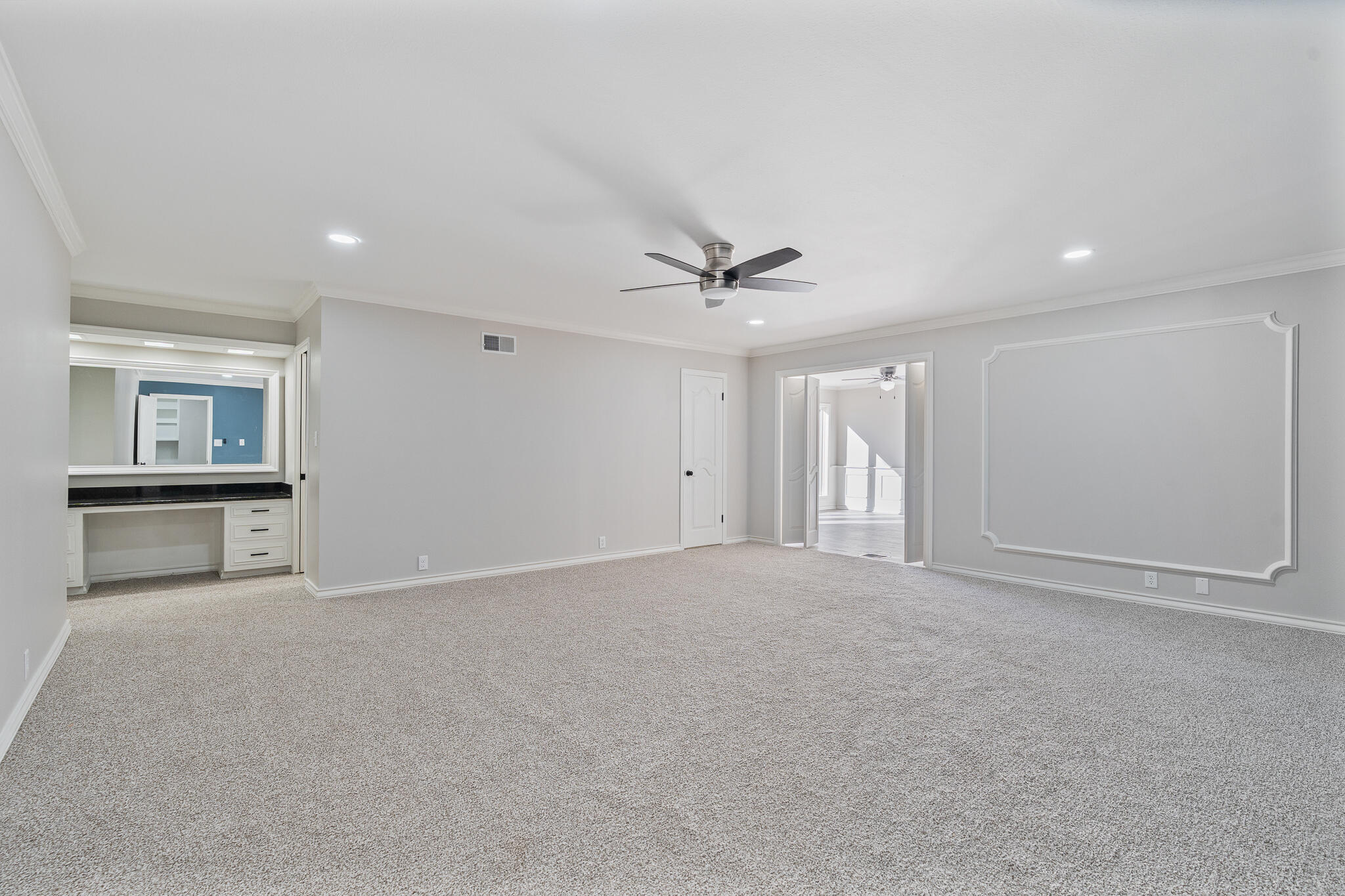 207 Yucca Terrace Plainview, TX 79072 - Photo 22 of 50 a view of an empty room with a kitchen