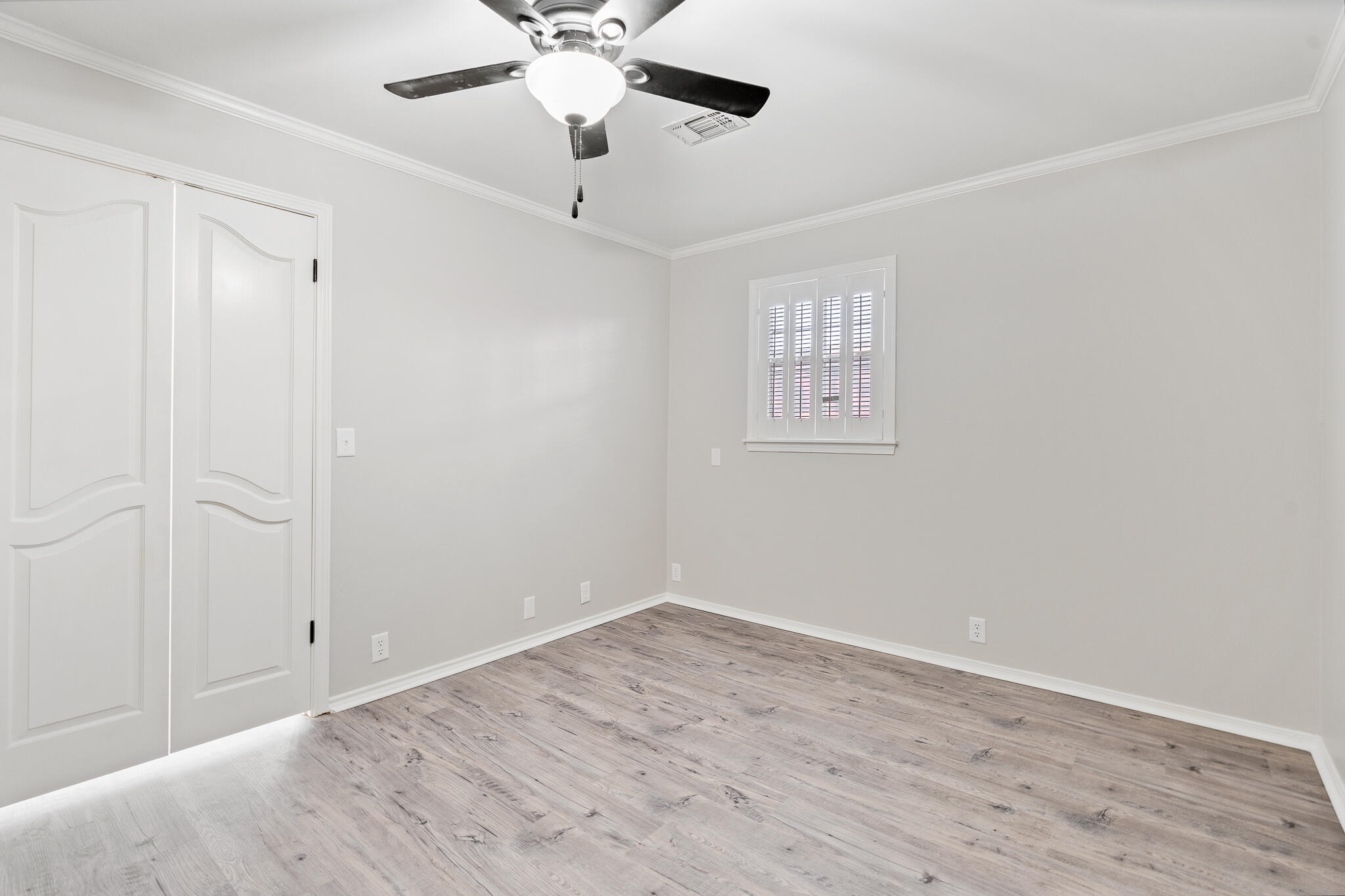 207 Yucca Terrace Plainview, TX 79072 - Photo 29 of 50 a view of an empty room with a window