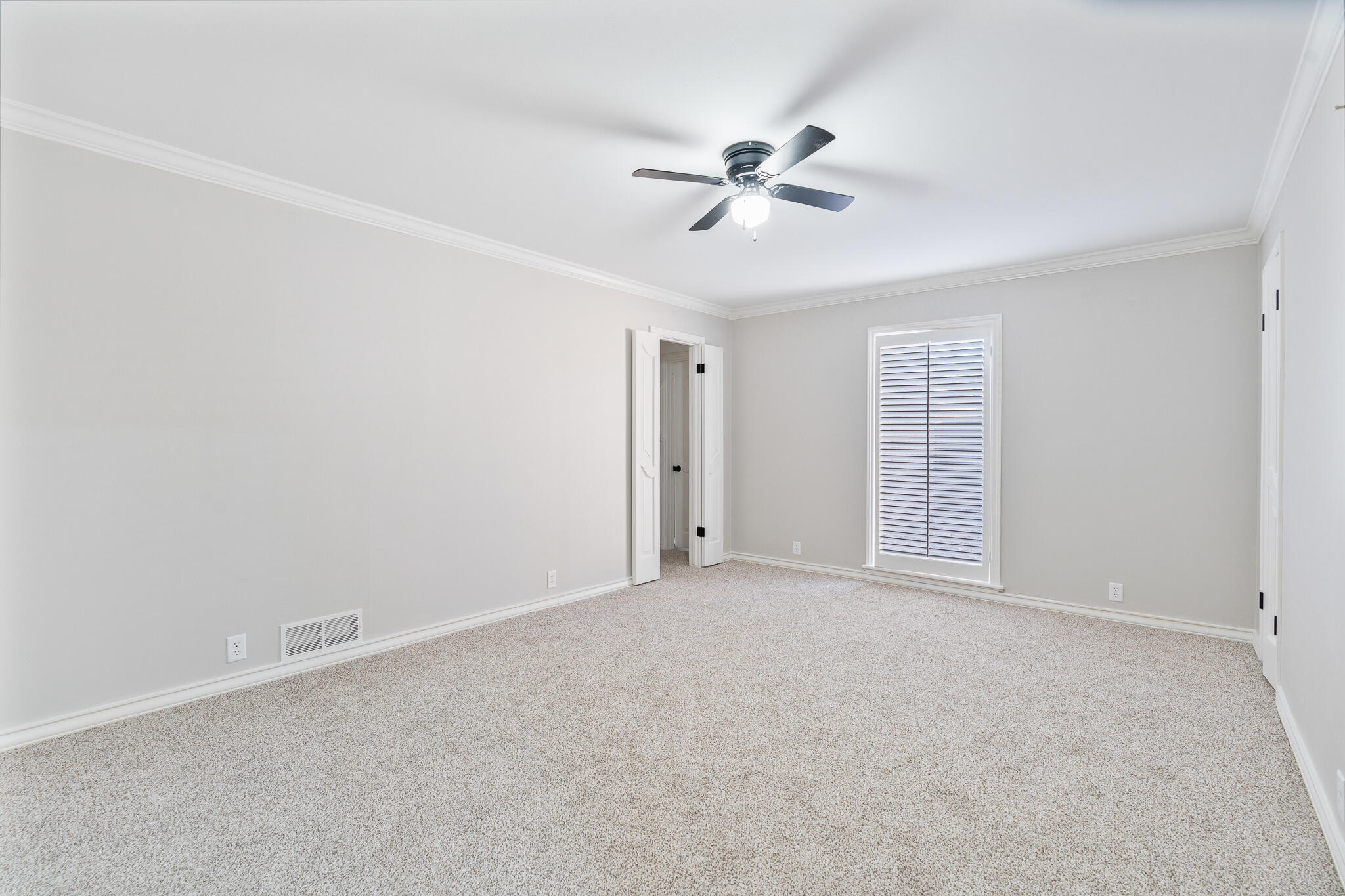 207 Yucca Terrace Plainview, TX 79072 - Photo 30 of 50 a view of an empty room with a window
