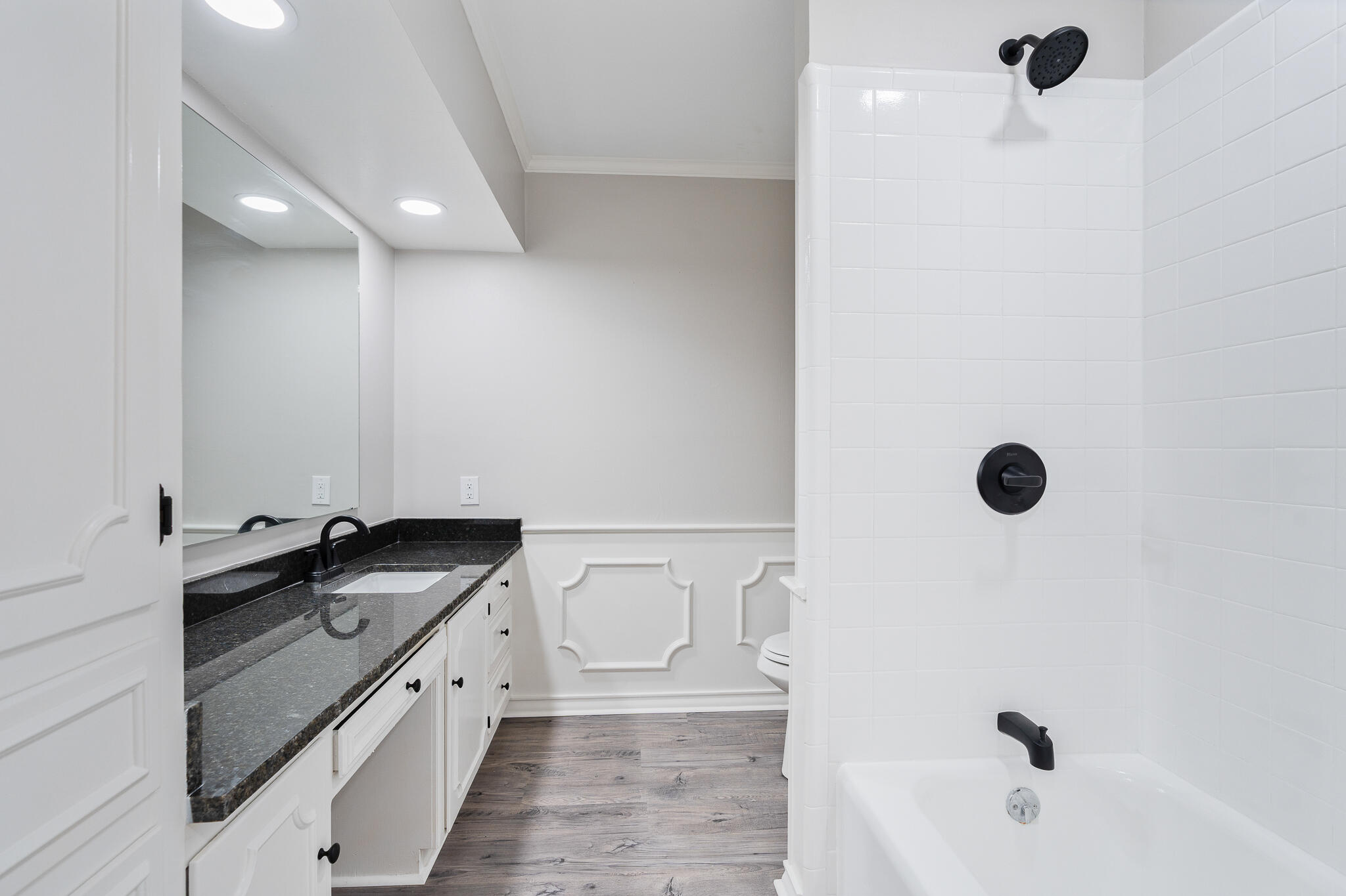 207 Yucca Terrace Plainview, TX 79072 - Photo 31 of 50 a bathroom with a granite countertop sink