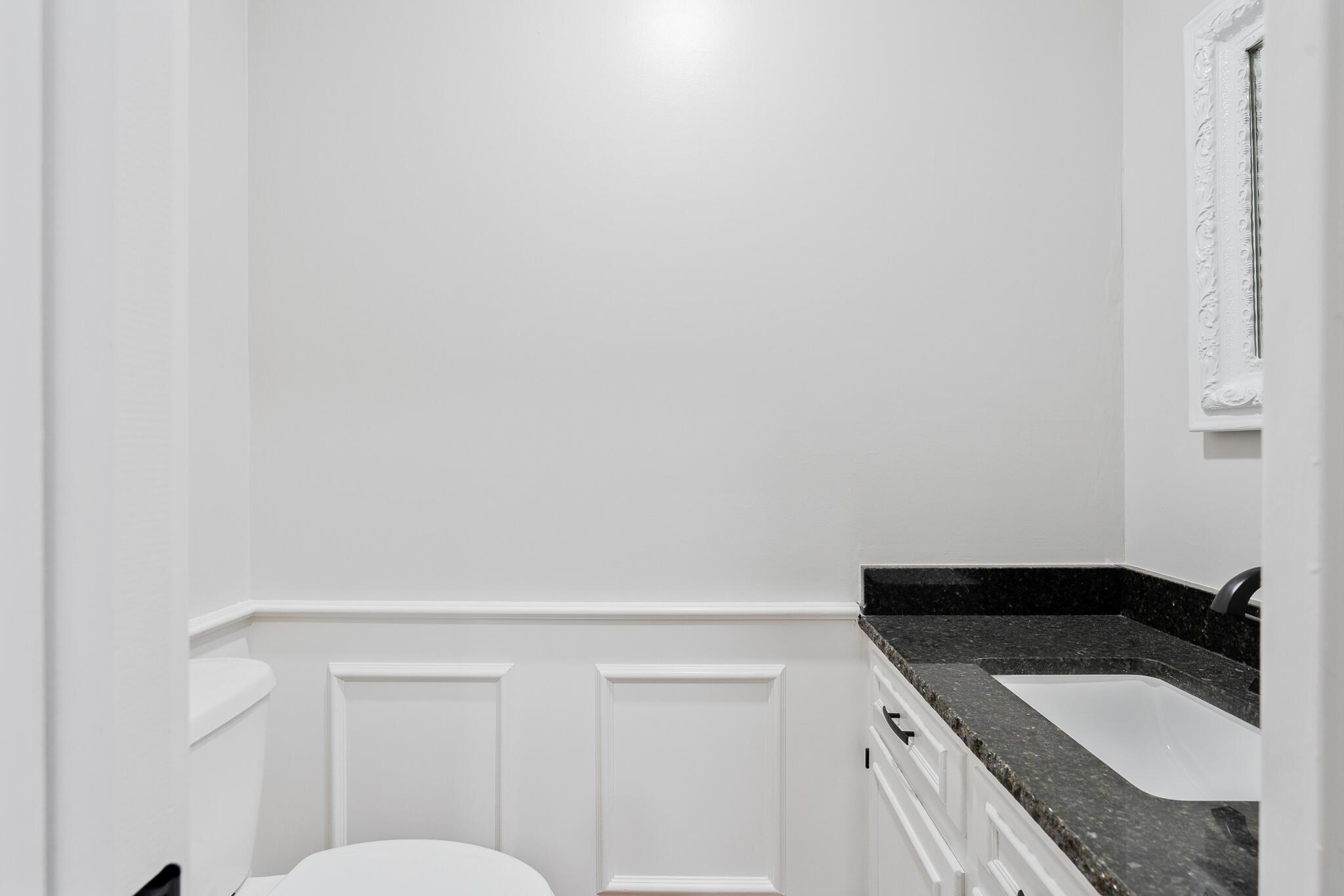 207 Yucca Terrace Plainview, TX 79072 - Photo 36 of 50 a bathroom with a sink and a toilet