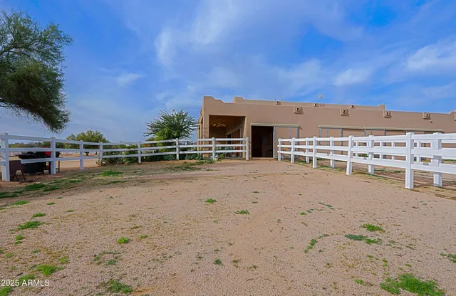 a bathroom with a toilet a sink and a mirror