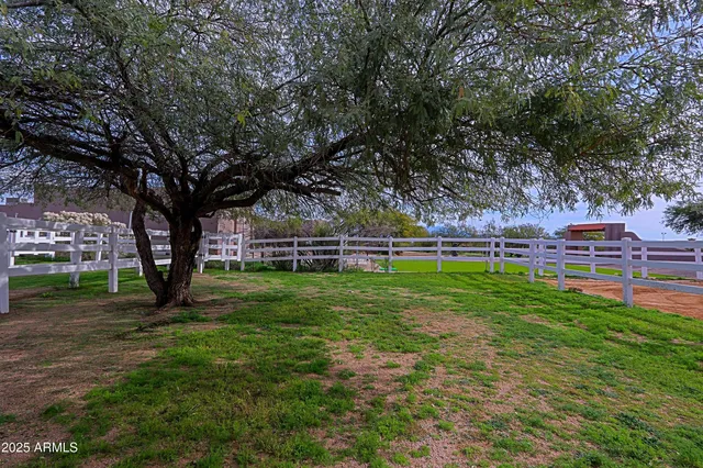 an aerial view of a house with a garden