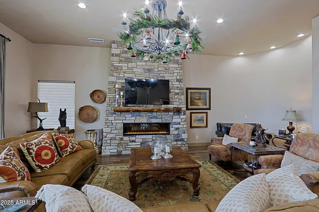 a kitchen with stainless steel appliances a stove a sink and a microwave