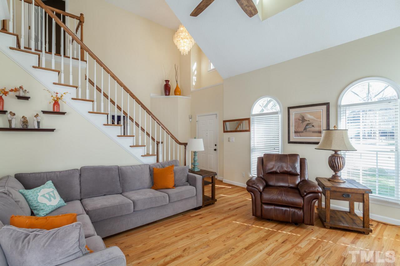 4601 Atterbury Court Raleigh, NC 27604 - Photo 13 of 25 a living room with furniture fireplace and a window