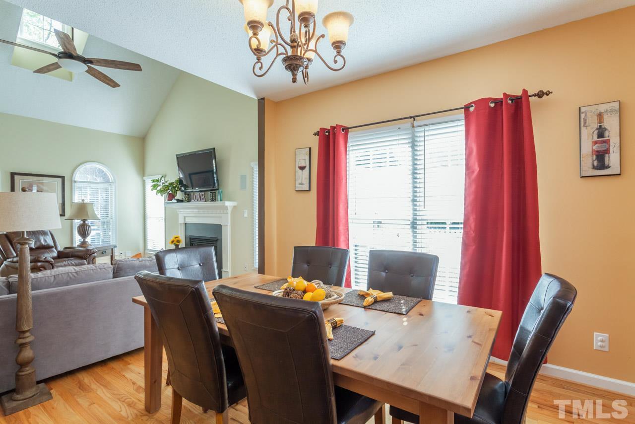 4601 Atterbury Court Raleigh, NC 27604 - Photo 3 of 25 a view of a dining room with furniture window and wooden floor