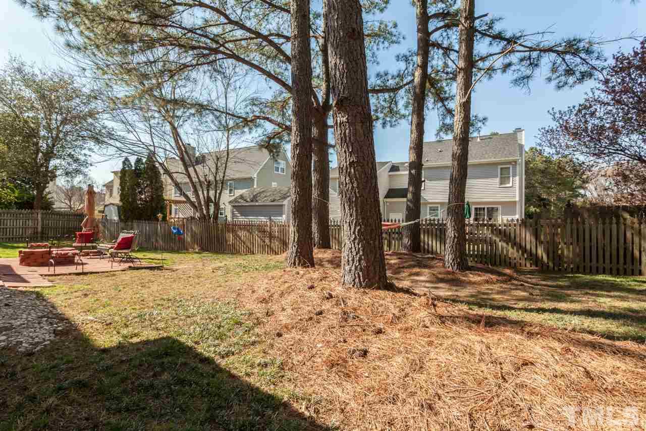 4601 Atterbury Court Raleigh, NC 27604 - Photo 23 of 25 a view of a backyard with a tree