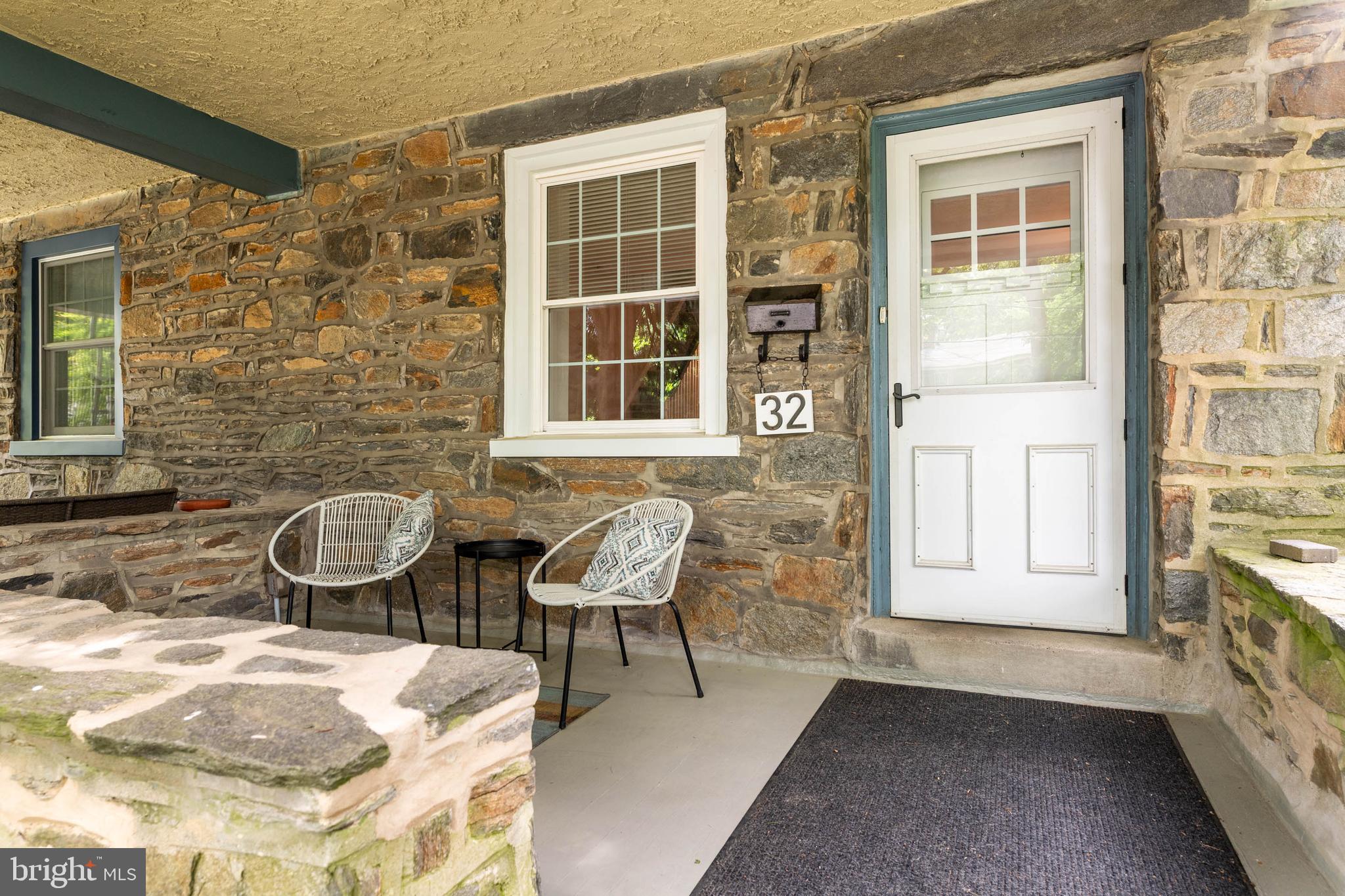 32 Chatham Road Ardmore, PA 19003 - Photo 2 of 23 a front view of a house with outdoor seating