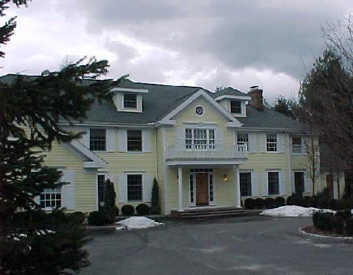 356 Nod Hill Road Wilton, CT 06897 - Photo 1 of 1 a front view of a house with a yard