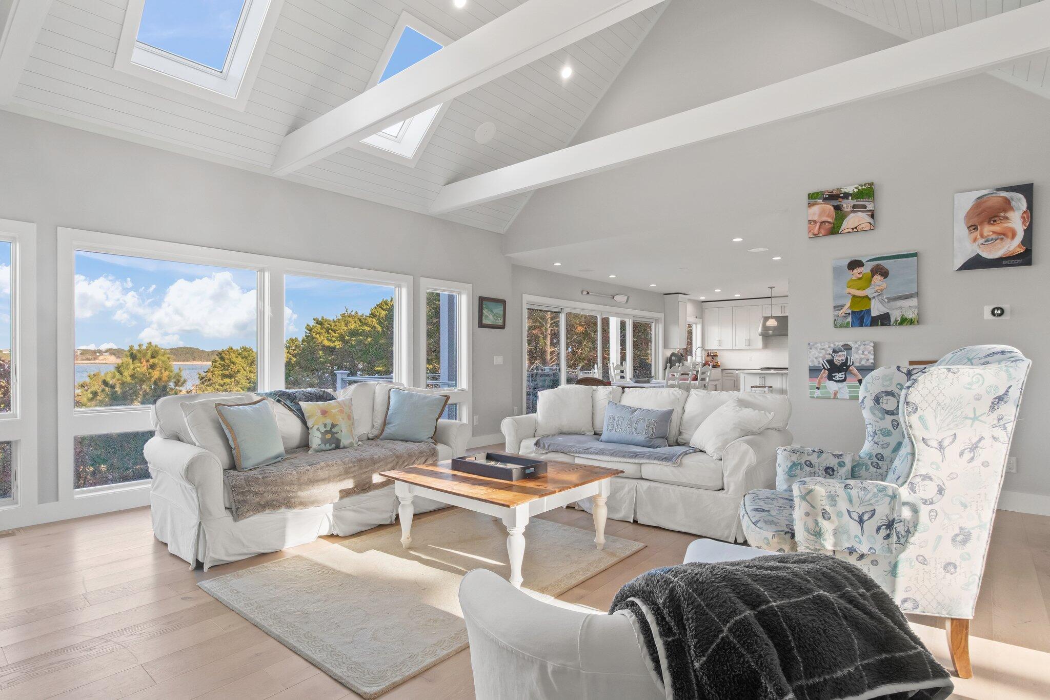 20 4th Avenue Wellfleet, MA 02667 - Photo 26 of 68 a living room with furniture and a large window