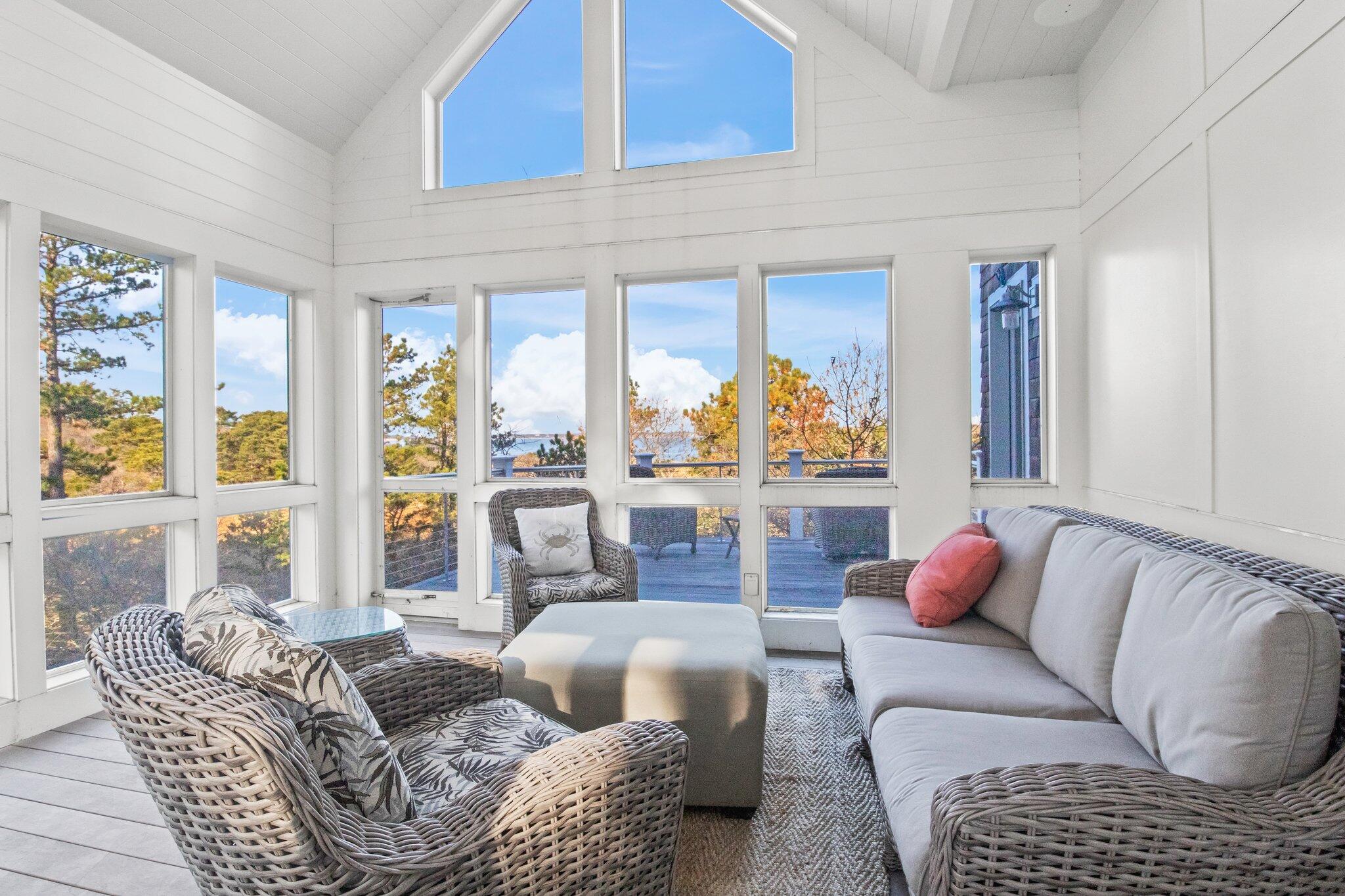 20 4th Avenue Wellfleet, MA 02667 - Photo 28 of 68 a living room with furniture and a large window