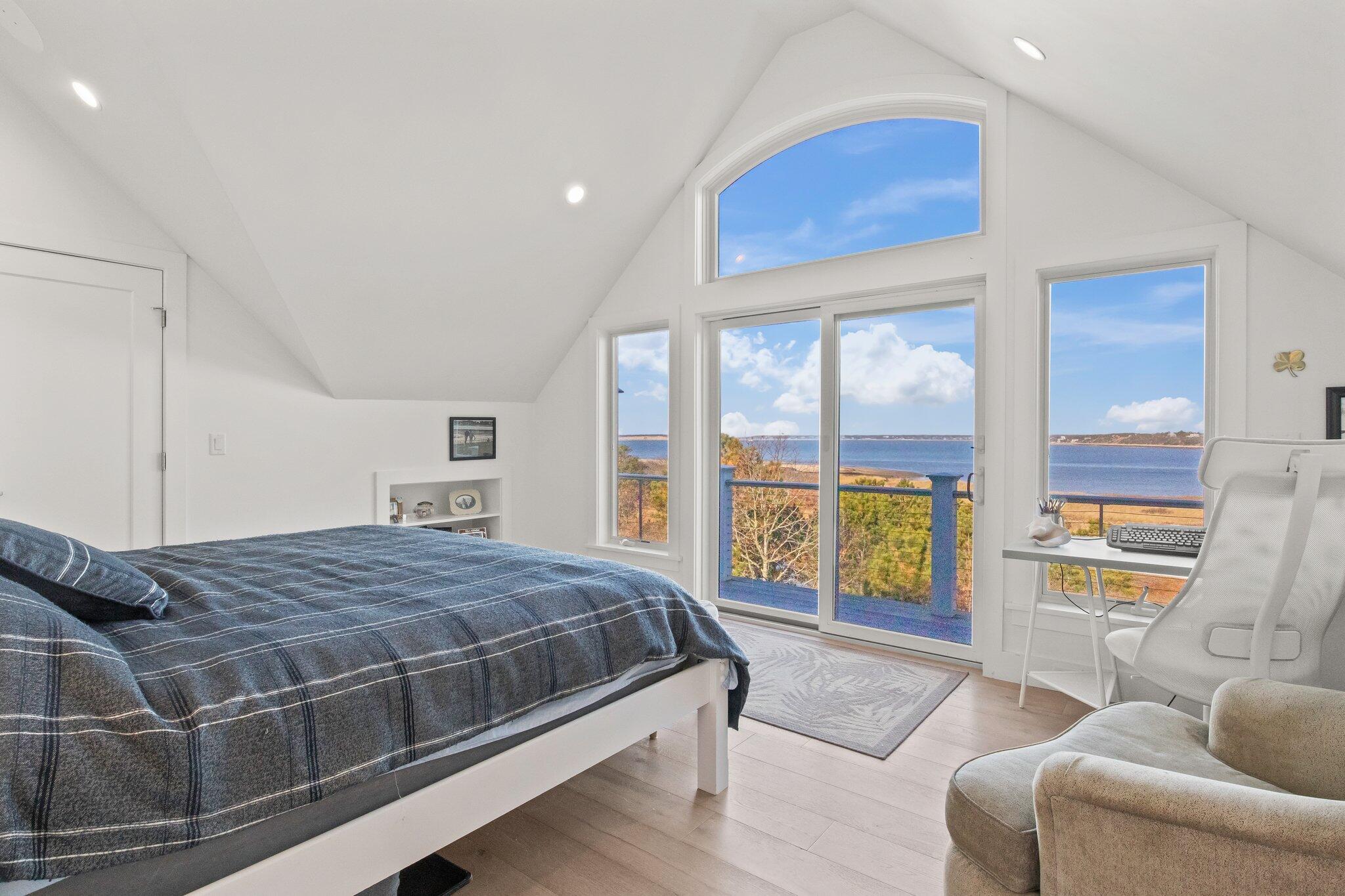20 4th Avenue Wellfleet, MA 02667 - Photo 30 of 68 a bedroom with a bed and a large window