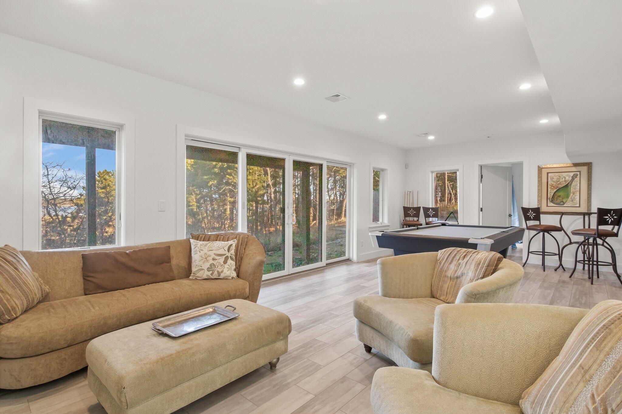 20 4th Avenue Wellfleet, MA 02667 - Photo 39 of 68 a living room with furniture and a large window