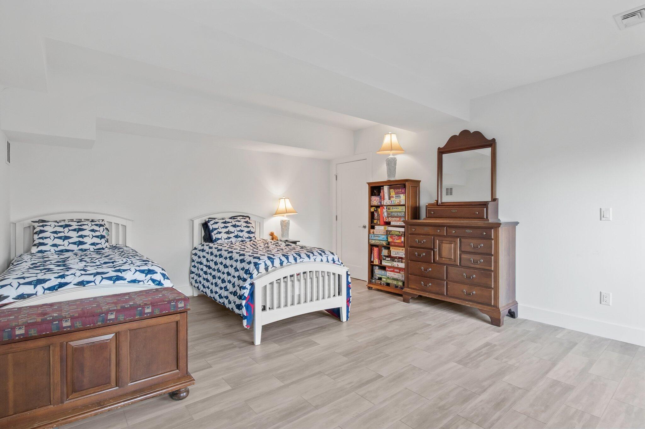 20 4th Avenue Wellfleet, MA 02667 - Photo 45 of 68 a bedroom with furniture and dresser