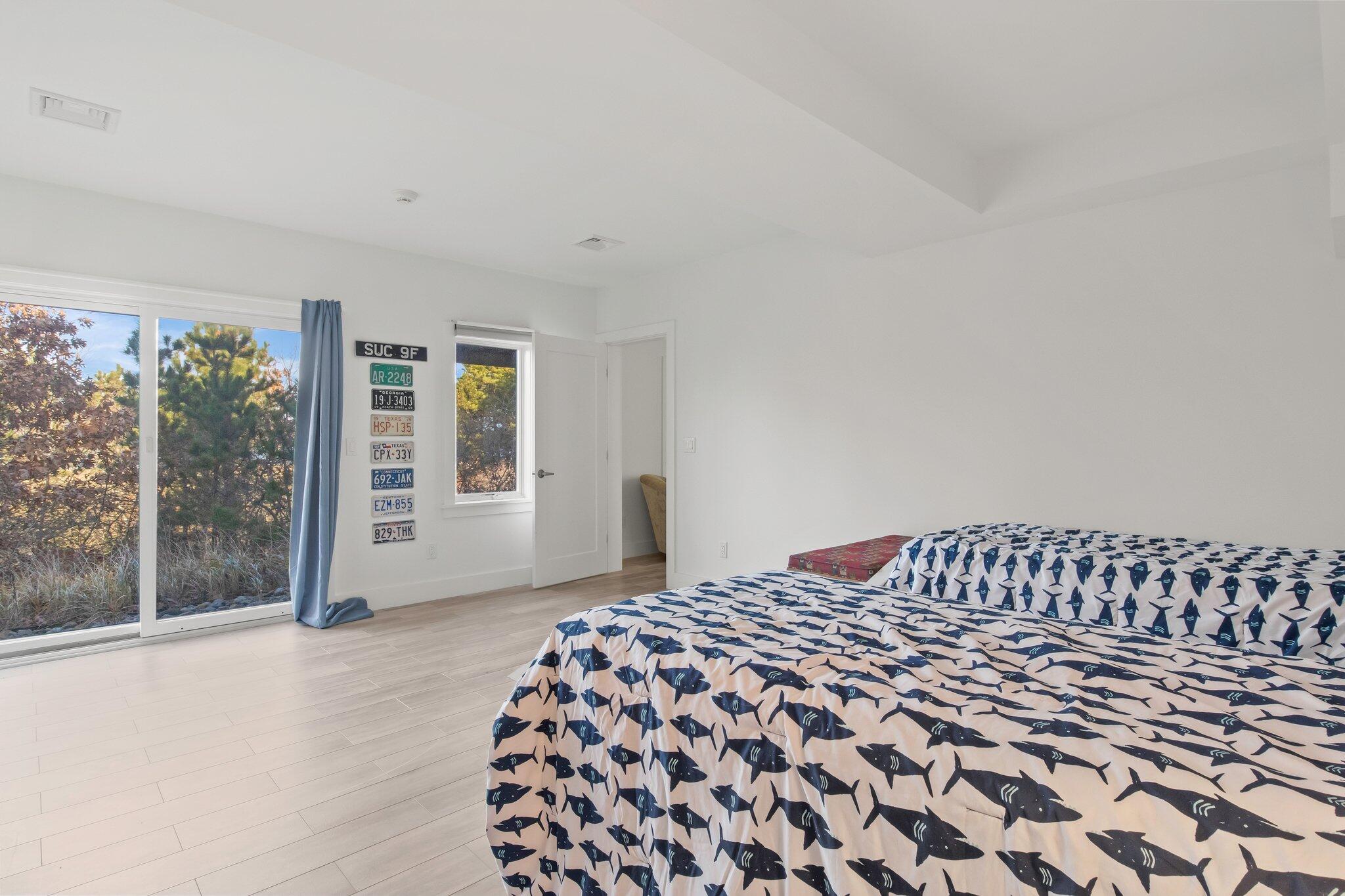 20 4th Avenue Wellfleet, MA 02667 - Photo 46 of 68 a bedroom with a bed and a window