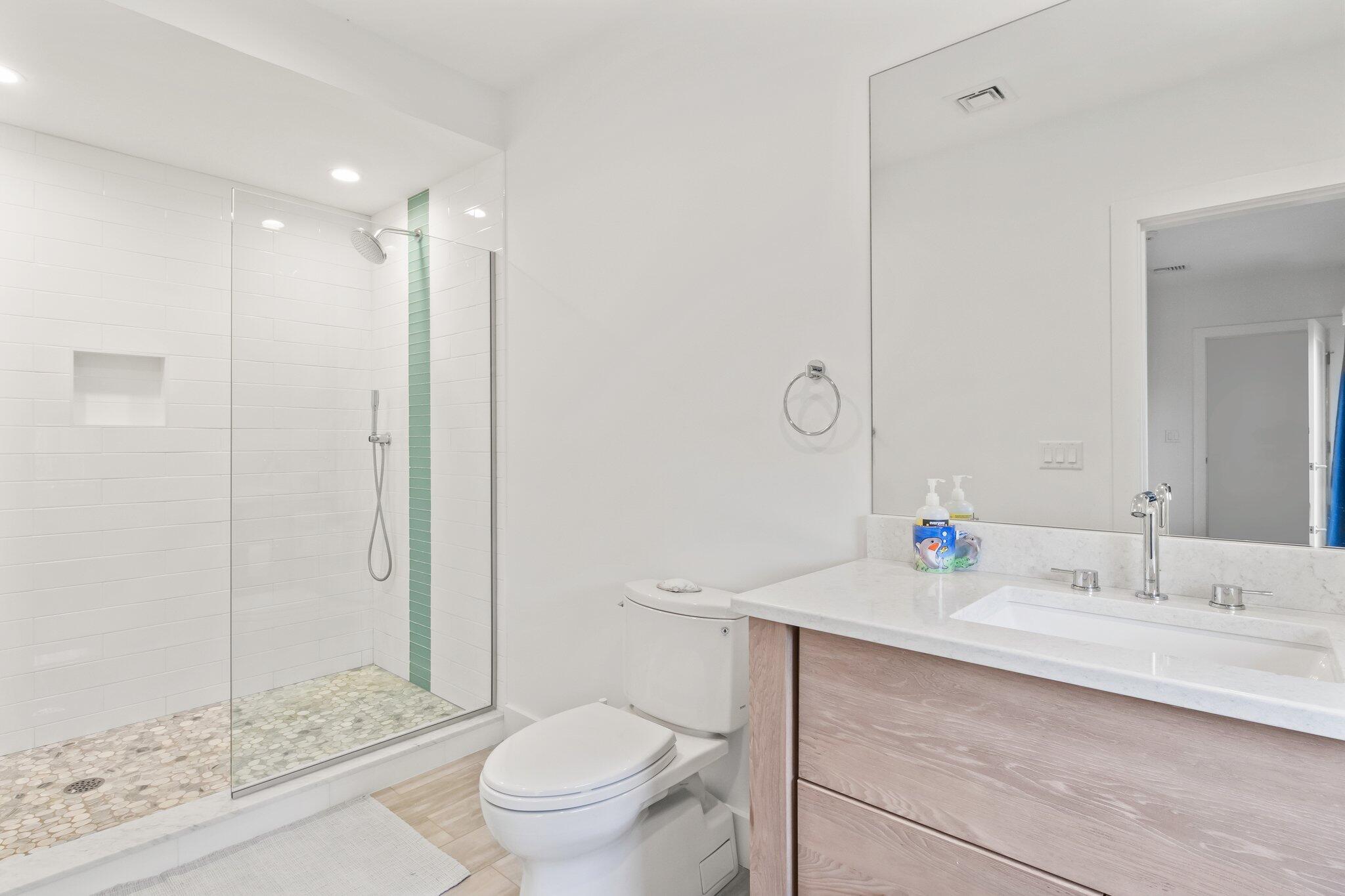 20 4th Avenue Wellfleet, MA 02667 - Photo 47 of 68 a bathroom with a sink toilet and shower