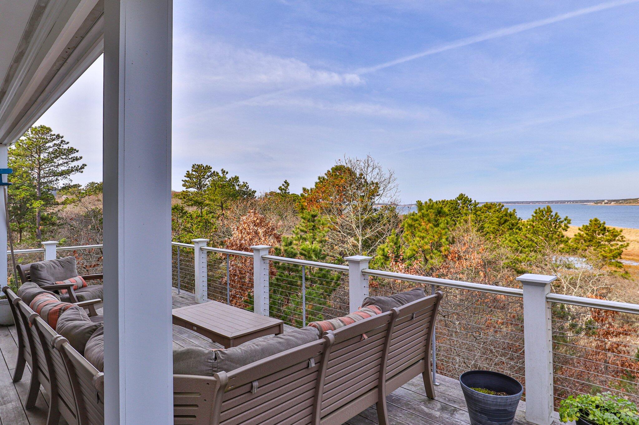 20 4th Avenue Wellfleet, MA 02667 - Photo 50 of 68 a view of a balcony with mountain view and wooden floor