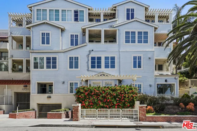 a front view of a multi story residential apartment building