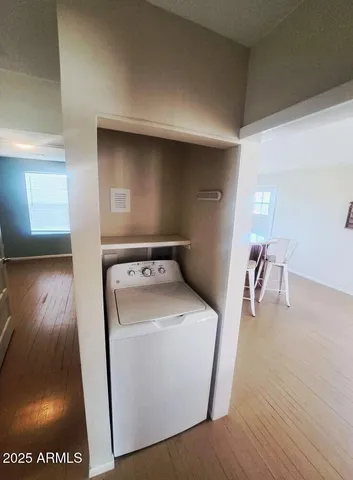 a utility room with dryer and washer