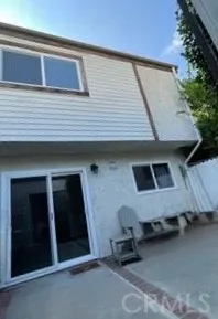 a front view of a house with a garage