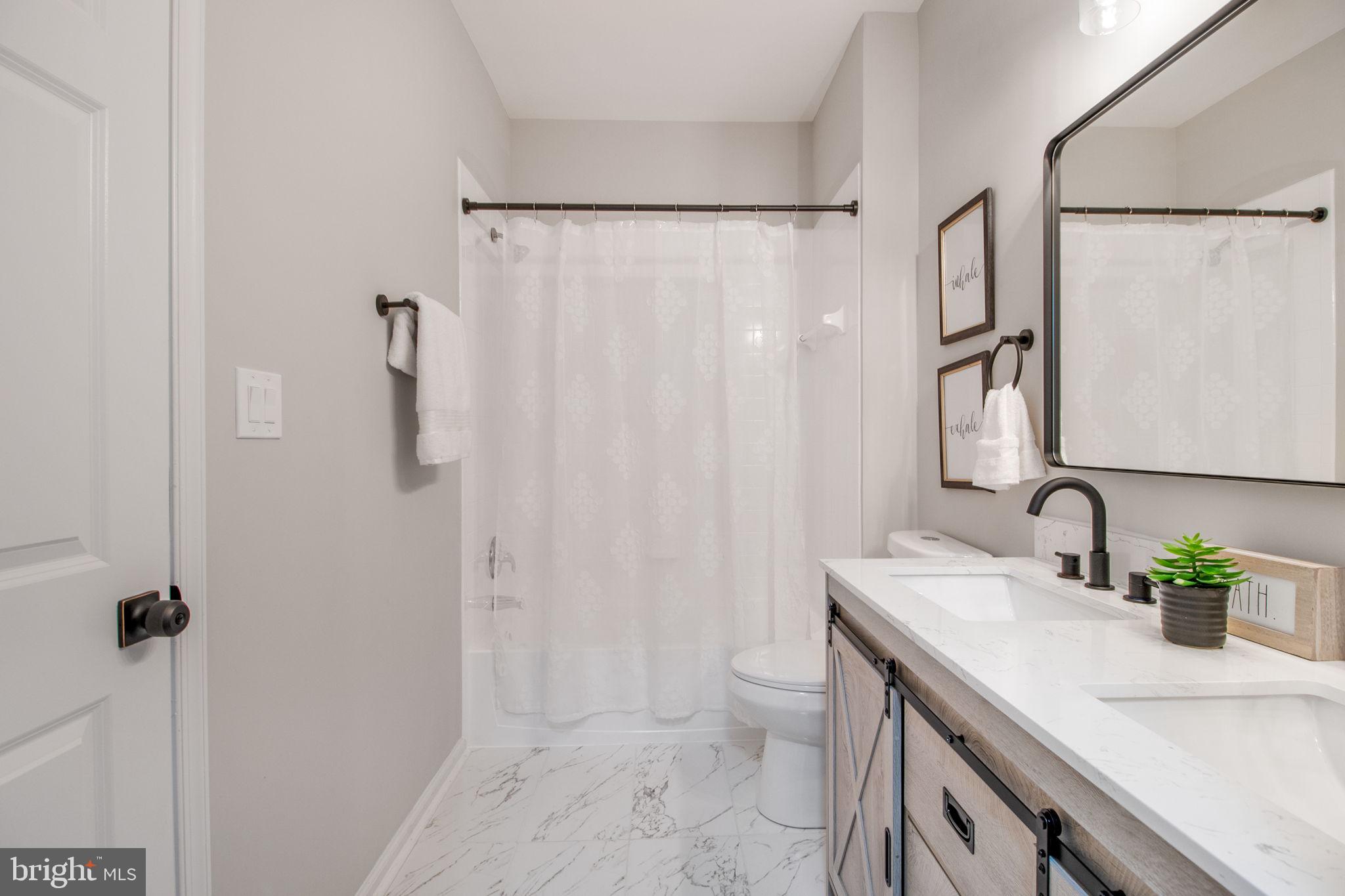 161 Danbury Street Southwest Washington, DC 20032 - Photo 26 of 44 Full bathroom (upstairs)