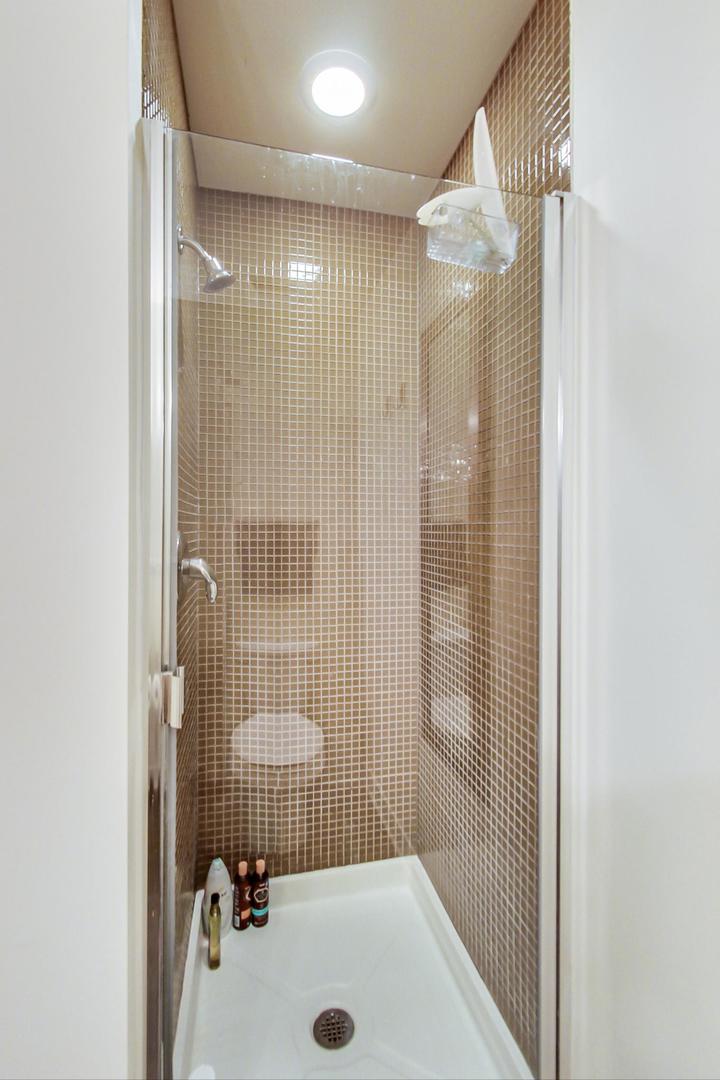 660 West Wayman Street, Unit 603 Chicago, IL 60661 - Photo 16 of 31 a bathroom with a shower