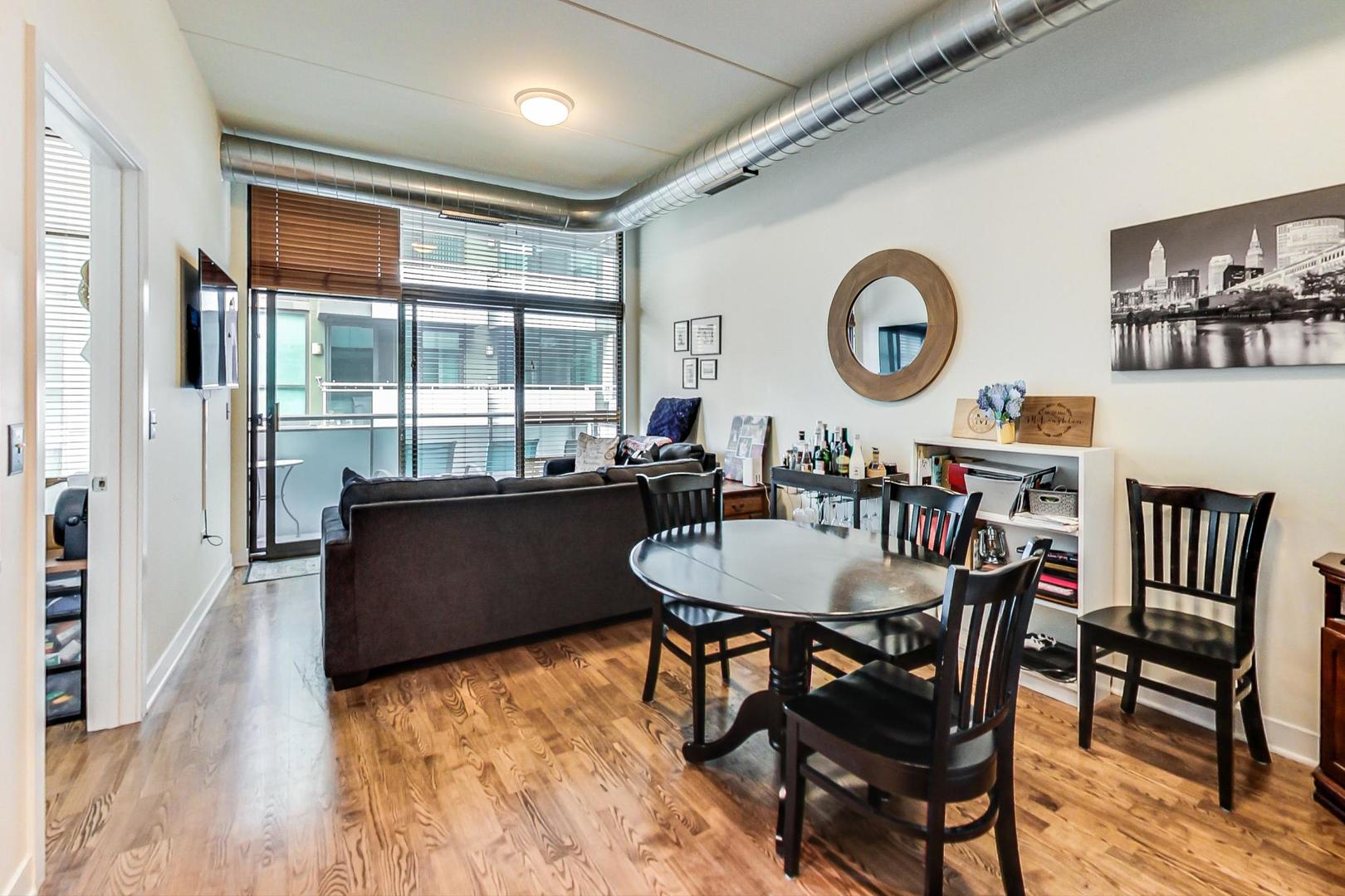 660 West Wayman Street, Unit 603 Chicago, IL 60661 - Photo 19 of 31 a living room with dining room and furniture