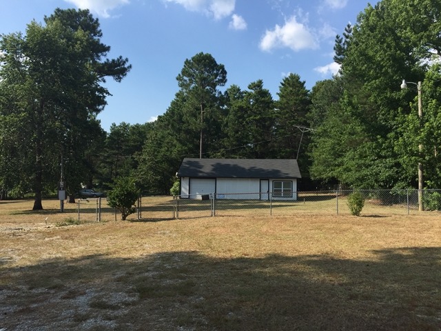 296 Juniper Creek Road Byron, GA 31008 - Photo 2 of 22 a view of a house with a yard