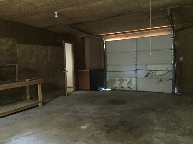 296 Juniper Creek Road Byron, GA 31008 - Photo 12 of 22 a view of an empty room with a fireplace